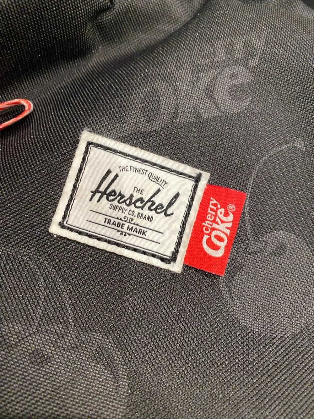 Herschel Supply Company Black Mini Backpack with Red Cherry Coke Tag